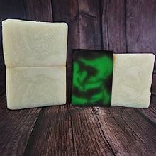 Load image into Gallery viewer, Celebration Artisan Soap with one bar shown glowing