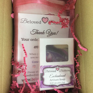 Enchantment Artisan Soap packaged in a box with a decorative label in a pink organza bag and thank you card